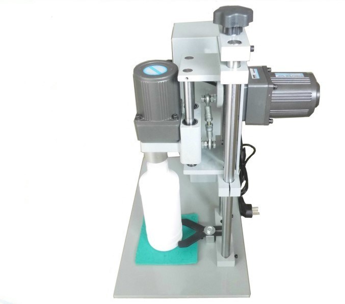 Sold-overseas-automatic-bottle-plastic-cap-shrink Shrink wrapping machine manufacturers in Chennai